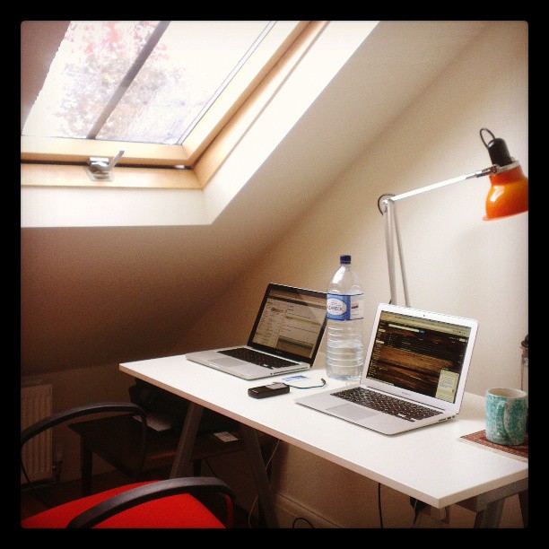 Serene home office in the attic, with rain pelting down just above my head.